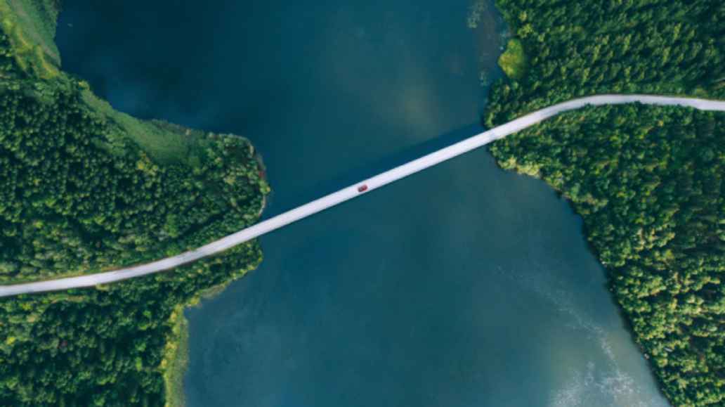 Bridge crossing over water, seen from above